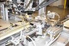 Used MGS Model TLC Top Load Cartoner with Robotic Pick and Place Unit.