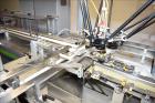 Used MGS Model TLC Top Load Cartoner with Robotic Pick and Place Unit.