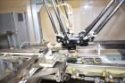 Used MGS Model TLC Top Load Cartoner with Robotic Pick and Place Unit.