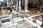 Used MGS Model TLC Top Load Cartoner with Robotic Pick and Place Unit.