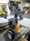Used Motoman Robot Packaging Robotic Case Packaging System. Consisting of Motoman robotic arm, model MPL80, 5-point articulation with 80 kg max capacity serial# S06A62-1-2, with pallet conveyors and ...