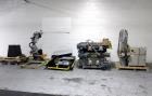 Used Motoman Robot Packaging Robotic Case Packaging System. Consisting of Motoman robotic arm, model MPL80, 5-point articulation with 80 kg max capacity serial# S06A62-1-2, with pallet conveyors and ...