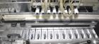 Used Bosch (Syntegon) Presto Robotic Top Load Robotic Carton loader. Capable of speeds up to 400 packages per minute. Has a product size range: Length 2