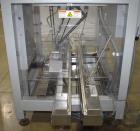 Used Bosch (Syntegon) Presto Robotic Top Load Robotic Carton loader. Capable of speeds up to 400 packages per minute. Has a product size range: Length 2