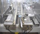 Used Bosch (Syntegon) Presto Robotic Top Load Robotic Case Packer capable of speeds up to 400 packages per minute.  Has a product size range: Length 2