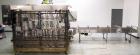 Used WePackIt Model 400CP Automatic Robotic Top Load Case Packer with Tier Shee