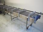 Used WePackIt Model 400CP Automatic Robotic Top Load Case Packer with Tier Shee