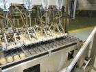 Used WePackIt Model 400CP Automatic Robotic Top Load Case Packer with Tier Shee