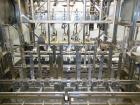 Used WePackIt Model 400CP Automatic Robotic Top Load Case Packer with Tier Shee