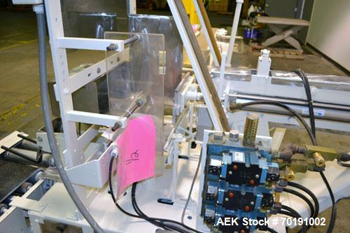Used ABC Model SP15 Semi-Automatic Case Packer. Machine is capable of speeds up to 15 cases per minute. Has an inline product feed, carton upstacker and automatic case take-away conveyor. Last used o...