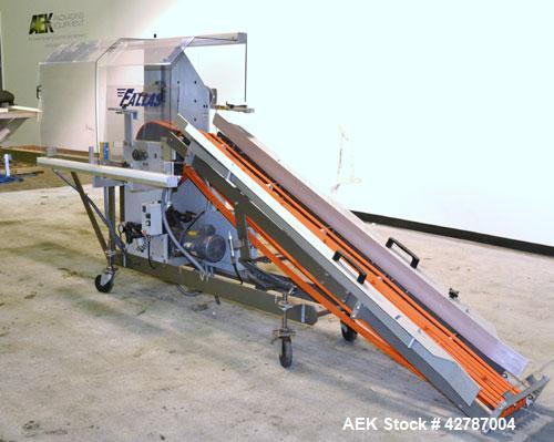 Used Fallas Automation Bag Collator, Model RW-1. Adjustable incline Eagle belting infeed, 8'' wide x 68'' long discharge belt conveyor. Includes a control panel with an Allen-Bradley Micrologix 1000,...
