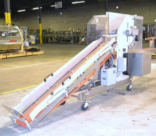 Used Fallas Automation Bag Collator, Model RW-1. Adjustable incline Eagle belting infeed, 8'' wide x 68'' long discharge belt conveyor. Includes a control panel with an Allen-Bradley Micrologix 1000,...
