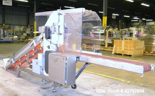 Used Fallas Automation Bag Collator, Model RW-1. Adjustable incline Eagle belting infeed, 8'' wide x 68'' long discharge belt conveyor. Includes a control panel with an Allen-Bradley Micrologix 1000,...