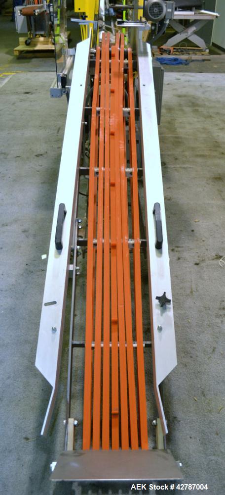 Used Fallas Automation Bag Collator, Model RW-1. Adjustable incline Eagle belting infeed, 8'' wide x 68'' long discharge belt conveyor. Includes a control panel with an Allen-Bradley Micrologix 1000,...