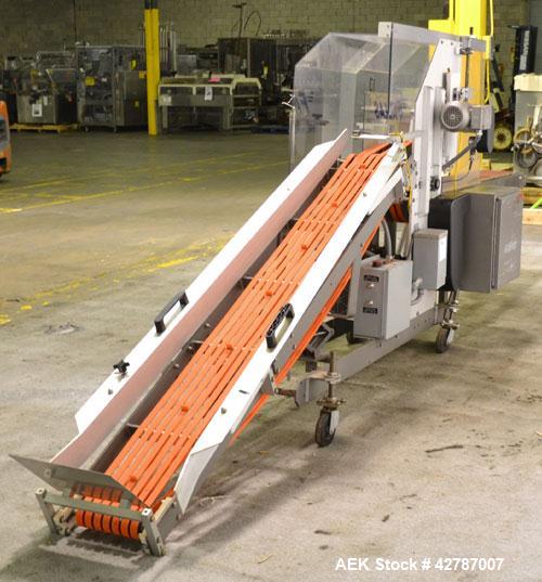 Used Fallas Automation Bag Collator, Model RW-1. Adjustable incline Eagle belting infeed, 8'' wide x 68'' long discharge belt conveyor. Includes a control panel with an Allen-Bradley Micrologix 1000,...