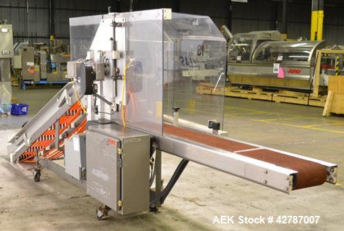 Used Fallas Automation Bag Collator, Model RW-1. Adjustable incline Eagle belting infeed, 8'' wide x 68'' long discharge belt conveyor. Includes a control panel with an Allen-Bradley Micrologix 1000,...