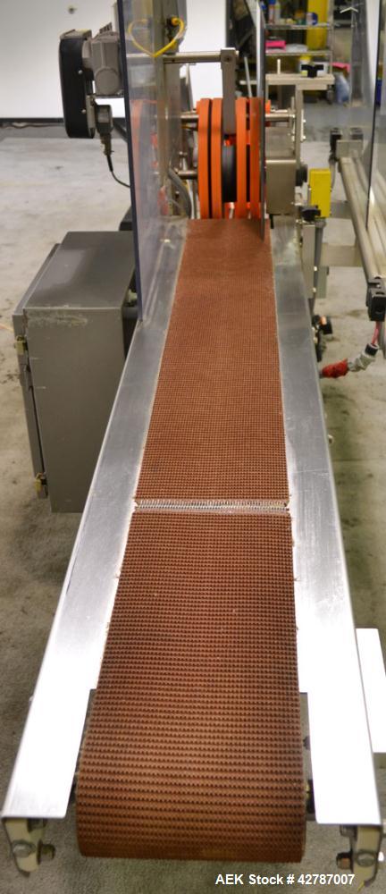 Used Fallas Automation Bag Collator, Model RW-1. Adjustable incline Eagle belting infeed, 8'' wide x 68'' long discharge belt conveyor. Includes a control panel with an Allen-Bradley Micrologix 1000,...