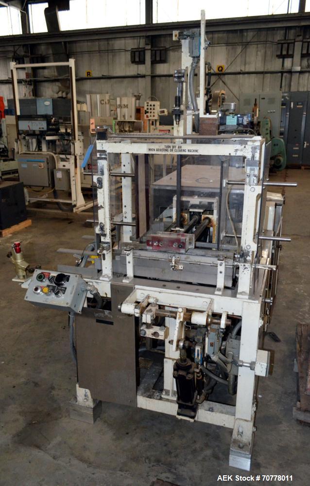 Used Salwasser Sure Way R101 semi automatic case packer. Has right angle infeed with carton upstacker. Case lowering device, last used with Jones CMV cartoner.