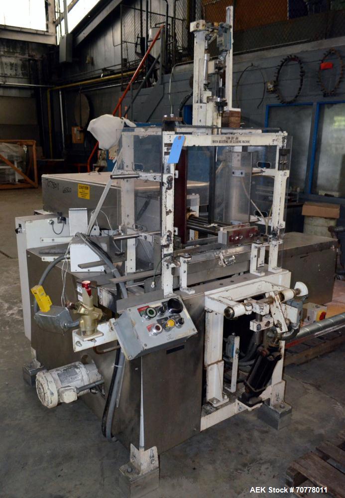 Used Salwasser Sure Way R101 semi automatic case packer. Has right angle infeed with carton upstacker. Case lowering device, last used with Jones CMV cartoner.