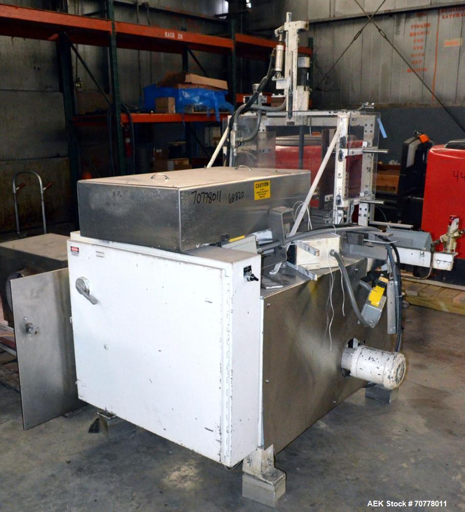 Used Salwasser Sure Way R101 semi automatic case packer. Has right angle infeed with carton upstacker. Case lowering device, last used with Jones CMV cartoner.