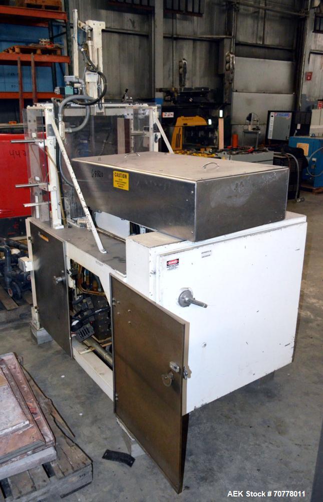 Used Salwasser Sure Way R101 semi automatic case packer. Has right angle infeed with carton upstacker. Case lowering device, last used with Jones CMV cartoner.