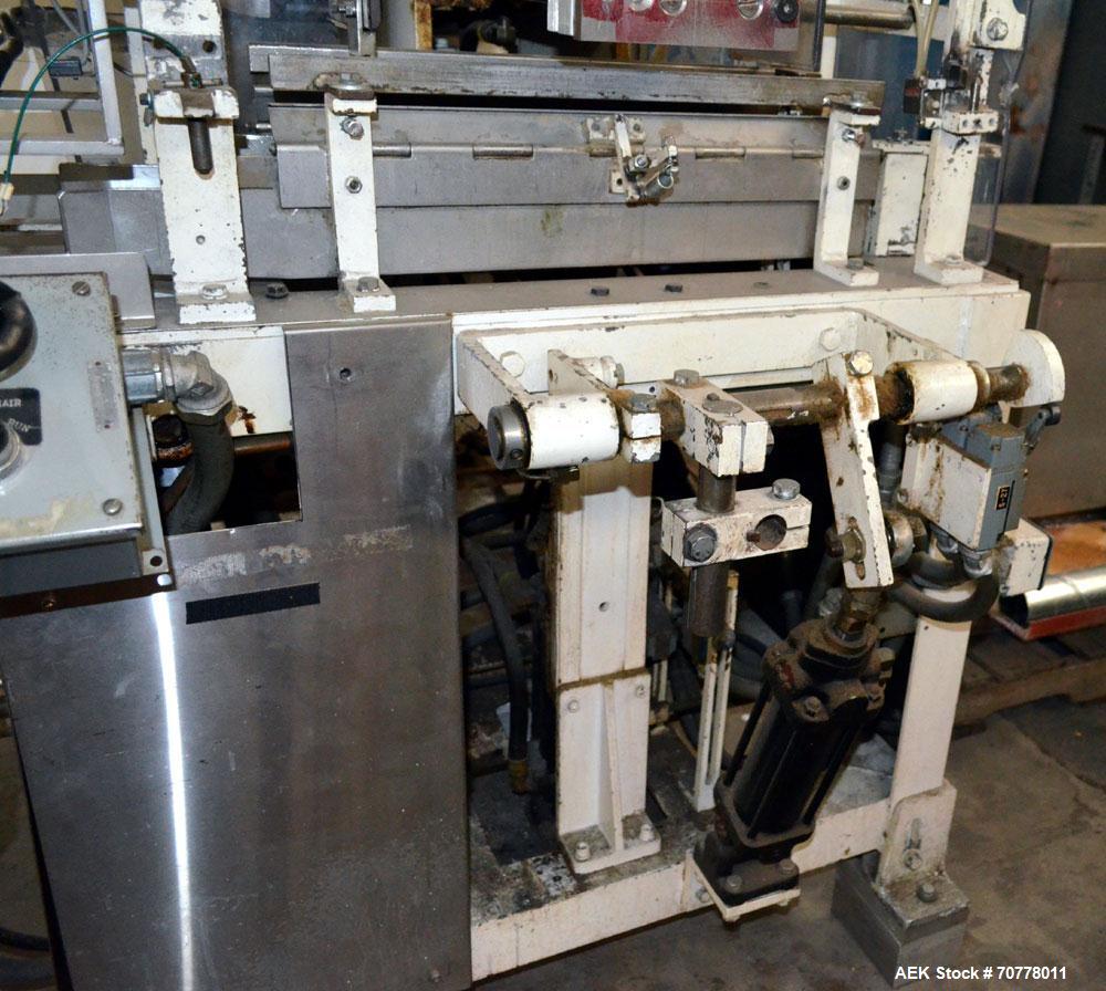 Used Salwasser Sure Way R101 semi automatic case packer. Has right angle infeed with carton upstacker. Case lowering device, last used with Jones CMV cartoner.