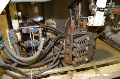 Used Salwasser Sure Way R101 semi automatic case packer. Has right angle infeed with carton upstacker. Case lowering device, last used with Jones CMV cartoner.