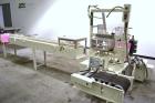 Used ABC Model SP15 Semi-Automatic Case Packer. Machine is capable of speeds up to 15 cases per minute. Has an inline product feed, carton upstacker and automatic case take-away conveyor. Last used o...