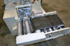 Used ABC Model SP15 Semi-Automatic Case Packer. Machine is capable of speeds up to 15 cases per minute. Has an inline product feed, carton upstacker and automatic case take-away conveyor. Last used o...