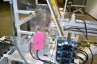 Used ABC Model SP15 Semi-Automatic Case Packer. Machine is capable of speeds up to 15 cases per minute. Has an inline product feed, carton upstacker and automatic case take-away conveyor. Last used o...