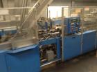 Used Douglas Case Packer, Model M-3409. 28-30 cases per minute, 128 oz. can/94 oz. can.