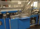 Used Douglas Case Packer, Model M-3409. 28-30 cases per minute, 128 oz. can/94 oz. can.