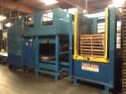 Used Douglas Case Packer, Model M-3409. 28-30 cases per minute, 128 oz. can/94 oz. can.