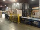 Used Douglas Case Packer, Model M-3409. 28-30 cases per minute, 128 oz. can/94 oz. can.