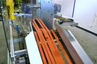Used Fallas Automation Bag Collator, Model RW-1. Adjustable incline Eagle belting infeed, 8'' wide x 68'' long discharge belt conveyor. Includes a control panel with an Allen-Bradley Micrologix 1000,...