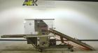Used Fallas Automation Bag Collator, Model RW-1. Adjustable incline Eagle belting infeed, 8'' wide x 68'' long discharge belt conveyor. Includes a control panel with an Allen-Bradley Micrologix 1000,...