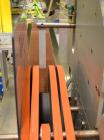 Used Fallas Automation Bag Collator, Model RW-1. Adjustable incline Eagle belting infeed, 8'' wide x 68'' long discharge belt conveyor. Includes a control panel with an Allen-Bradley Micrologix 1000,...