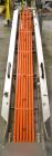 Used Fallas Automation Bag Collator, Model RW-1. Adjustable incline Eagle belting infeed, 8'' wide x 68'' long discharge belt conveyor. Includes a control panel with an Allen-Bradley Micrologix 1000,...