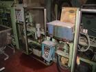 Used Pearson Case Packer with Nordson hot melt glue applicator and carton in-feed magazine.  Seems in fair condition mechanically.