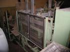 Used Pearson Case Packer with Nordson hot melt glue applicator and carton in-feed magazine.  Seems in fair condition mechanically.