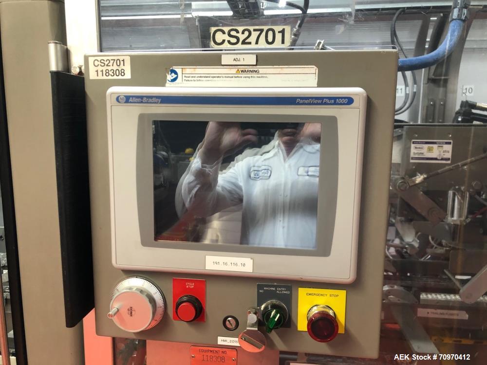 Used Douglas Machine Axiom Wraparound Case/Tray Packer. Capable of Speeds up to 55 cases per minute. Has a inside case size range: 8.125" - 12.81" (direction of travel) x 4.18" - 9.15" )hight) x 9.45...