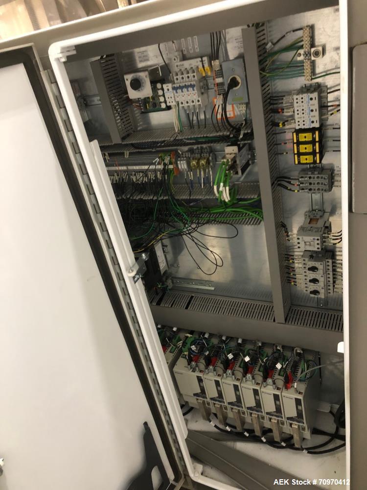 Used Douglas Machine Axiom Wraparound Case/Tray Packer. Capable of Speeds up to 55 cases per minute. Has a inside case size range: 8.125" - 12.81" (direction of travel) x 4.18" - 9.15" )hight) x 9.45...