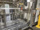Used Invopac Canpac Wraparound Casepacker – Up to 25 CPM – Allen Bradley Controls – Hot Melt Glue – Pack Patterns 3x2x1, 4x3x1
