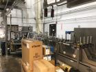 Used Douglas Machine Axiom Wraparound Case/Tray Packer. Capable of Speeds up to 55 cases per minute. Has a inside case size range: 8.125
