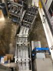 Used Douglas Machine Axiom Wraparound Case/Tray Packer. Capable of Speeds up to 55 cases per minute. Has a inside case size range: 8.125