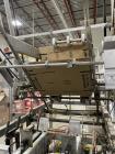 Usado: empacadora de cajas envolvente automática Zepf Technologies Serie Z Pro. Tiene Allen Bradley Panel View Plus 1000 HMI...