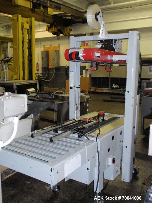 Used 3M-Matic Top and Bottom Random Case Sealer, Model 700R, Type 39600, Carbon Steel. Up to 15 cases per minute, minimum case size 6" wide x 4.75" high x 6" long, maximum case size 21.5" wide x 24.5...