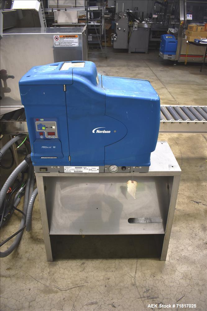 Used Pearson Model CS40-G Automatic Stainless Steel Hot Melt Top Case Sealer.