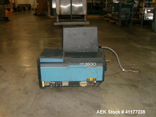 Used Elliott Top Only Hot Melt Case Sealer, ModelHMT-MINI. Capable of speeds up to 40 cpm. The extra-short Elliott HMT-MINI is only 9' 2" by 36" wide. Fully automatic, it delivers cases at high speed...
