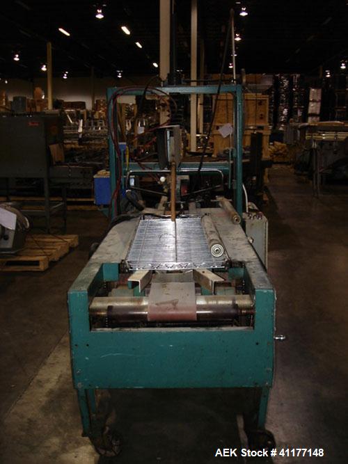 Used General Corrugated Hot Melt Top and Bottom Case Sealer, Model 2000. Includes a Nordson HM V glue unit, model 244305, Serial #A2L01286. 3/60/220V.